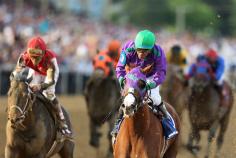 Preakness 2014: California Chrome completes second leg of Triple Crown

BALTIMORE — California Chrome repelled one challenger and then put away another in the stretch to win the Preakness on Saturday, setting up a Triple Crown try in three weeks.

The chestnut colt with the four white feet will attempt to sweep the Kentucky Derby, Preakness and Belmont Stakes, something that hasn’t been done since Affirmed in 1978. Since then, 12 horses have won the first two legs and failed to complete the sweep; the last was I’ll Have Another two years ago.

Maybe the horse with the modest pedigree and average Joe owners is the one.

California Chrome defeated Ride On Curlin by 1 ½ lengths at Pimlico, covering 1 3/16 miles in 1:54.84. He’s now won six straight races by a combined 27 ½ lengths for 77-year-old trainer Art Sherman.

"It’s quite a thrill," Sherman said. "I knew we had to run harder this race."

California Chrome bounced out of the gate running, with jockey Victor Espinoza moving the colt into the clear. Pablo Del Monte, a 34-1 shot, charged to the lead and was soon joined by filly Ria Antonia.

Espinoza tucked California Chrome into third, an ideal spot behind the leaders. They stayed there until making their move approaching the final turn.

California Chrome made a move for the lead, catching Pablo Del Monte while Social Inclusion joined the chase. Pablo Del Monte soon dropped back along the rail, and California Chrome sprinted away from Social Inclusion at the top of the stretch.

But there was one more challenge to come.

Ride On Curlin, next-to-last in the 10-horse field, ranged up and briefly appeared ready to overtake California Chrome. Once again showing his class, California Chrome denied the threat.

"It’s an awesome feeling," Espinoza said. "Today it was just a crazy race. I got more tired mentally than physically. I see another horse go to the front. I was going to sit second. .. I sit back, as soon as the other horse got clear of me, it worked out perfect."

California Chrome paid $3, $3 and $2.40. Ride On Curlin returned $5.60 and $3.80, while Social Inclusion was another 6 ½ lengths back in third and paid $3.40 as the 5-1 second choice.

General a Rod was fourth, followed by Ring Weekend, Pablo Del Monte, Dynamic Impact, Kid Cruz, Bayern and Ria Antonia.

California Chrome became the first California-bred to win the Preakness since Snow Chief in 1986. 