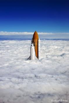 Space Shuttle Breaching the Clouds.