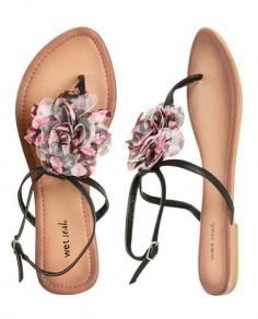 This gave me an idea. I want to get a pair of plain black sandles, and find a bunch of clips, bows, pins or whatever to attach to the sandles. That way you'll always have sandles to match any outfit without spending a fortune!