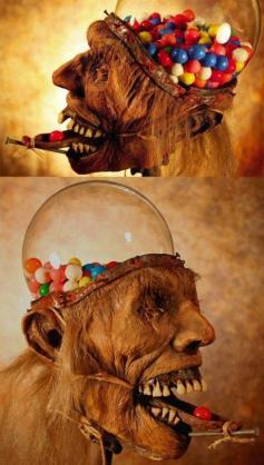 Zombie head gumball machine. @Maggie Martin you need this.
