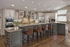 Slate grey cabinets. Love this kitchen set up.