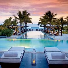 Bristol Buenaventura, Panama -This ocean-view infinity pool was designed to blend right in with the beach, complete with towering palms built into its landscaping. Located west of Panama City, the resort is just steps from a white-sand beach; rooms have ocean, lagoon, or private garden views.