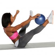Work your abs in a serious way with the Toe Touch exercise. Bonus: Your shoulders, back and hips will feel it, too.