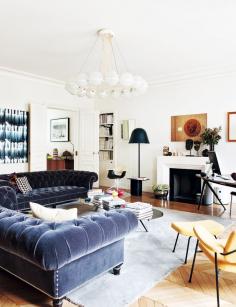 Inside an Eclectic Parisian Pad// chesterfield sofa, modern lighting, modern chandelier, Paris