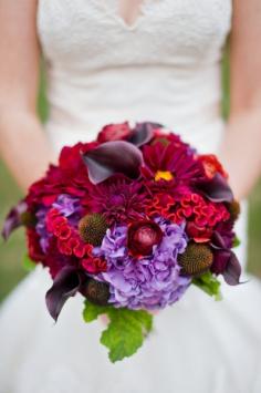 Nice fall floral mix. Could add a pop of orange to offset the deep burgundies and purple. Flowers include hydrangea, dahlias, callas, and cock's comb.
