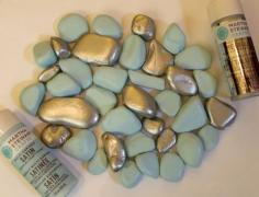 painted rocks - why did I never think of this? Rocks from the dollar tree painted to match any decor. Put them in a glass container with a candle.