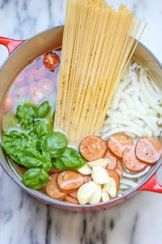 One Pot Pasta with smoked andouille, onions, and tomato - Damn Delicious