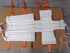A Neil Robertson Stretcher is a highly effective rescue device designed specifically for transporting injured individuals through narrow passageways, confined spaces, and challenging maritime environments. Commonly used aboard ships, offshore platforms, and industrial facilities, this stretcher has become a standard piece of emergency rescue equipment. Seaonbag supplies dependable Neil Robertson Stretchers designed to meet demanding rescue requirements. The unique design of the Neil Robertson Stretcher allows a casualty to be securely wrapped and immobilized during transportation. This makes it particularly useful for moving injured persons through stairways, engine rooms, ladders, and other restricted-access areas where conventional stretchers may be difficult to use. Constructed from durable materials, the stretcher provides strong support while remaining lightweight and easy to handle. Multiple securing straps help stabilize the patient and minimize movement during rescue operations. Its compact storage design makes it ideal for vessels and offshore facilities where space is limited. The Neil Robertson Stretcher is widely recognized in the maritime industry as an essential emergency response tool. It is commonly carried aboard cargo ships, passenger vessels, offshore installations, and marine training centers. Rescue teams value its reliability and effectiveness during emergency evacuations. Seaonbag offers quality rescue and safety equipment trusted by maritime professionals worldwide. Our Neil Robertson Stretcher is designed to improve rescue efficiency while ensuring patient safety during transport. Whether used for shipboard emergencies, offshore rescue operations, or industrial evacuations, this stretcher provides dependable performance when rapid casualty extraction is required.